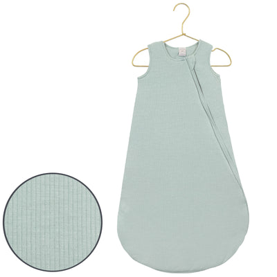 Light blue baby sleeping bag on a hanger with close-up of fabric texture.